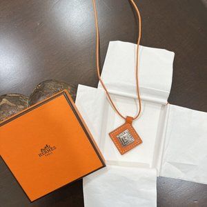 Hermes Touareg Sterling Silver and Orange Leather Necklace Pendant New